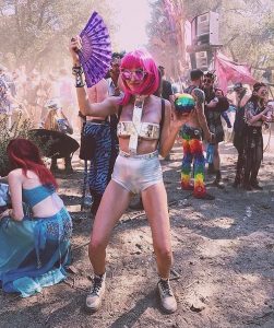 female in unique festival outfit