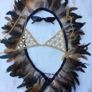 Burning man festival inspiration.A new feather top (avaiable soon!) teamed with our Delta bralette and these amazing skinny shades by Poppy Lissiman.