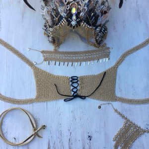 Burning man festival ready.Sneak peak at our new chain mail bra with a tiw up front. We are in love with this design and team it with Minka choker, our new chain mail hand piece and snake belt. Crowing yourself in a http://www.chelseasflowercrowns.com/, queen of the burning man festival !!
